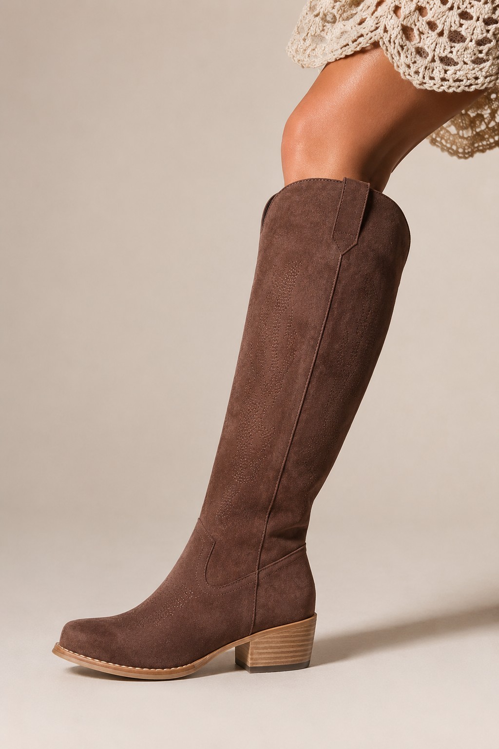Brown suede western knee-high boot with stitched detail