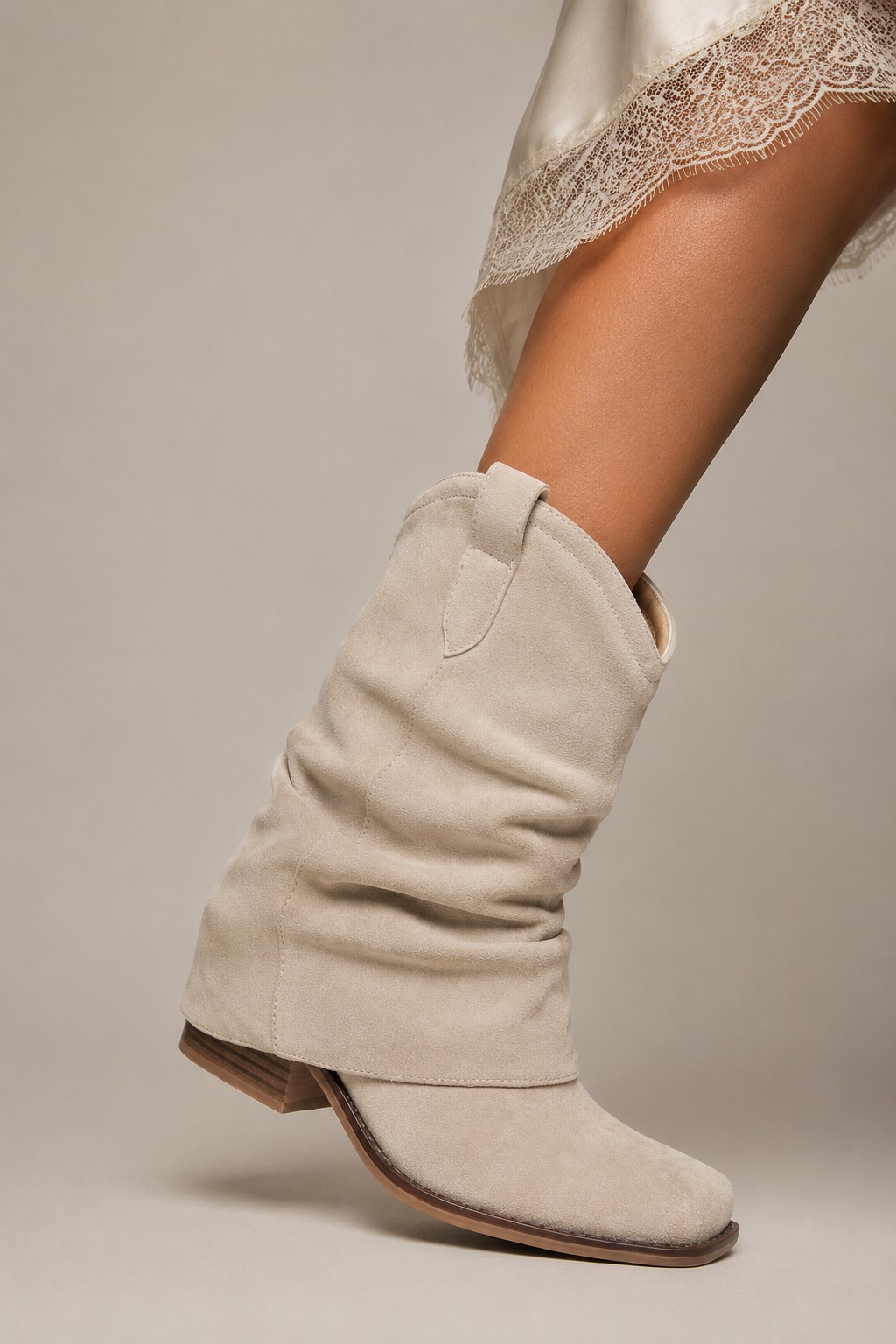 Bone suede fold-over slouch western boot with stacked heel
