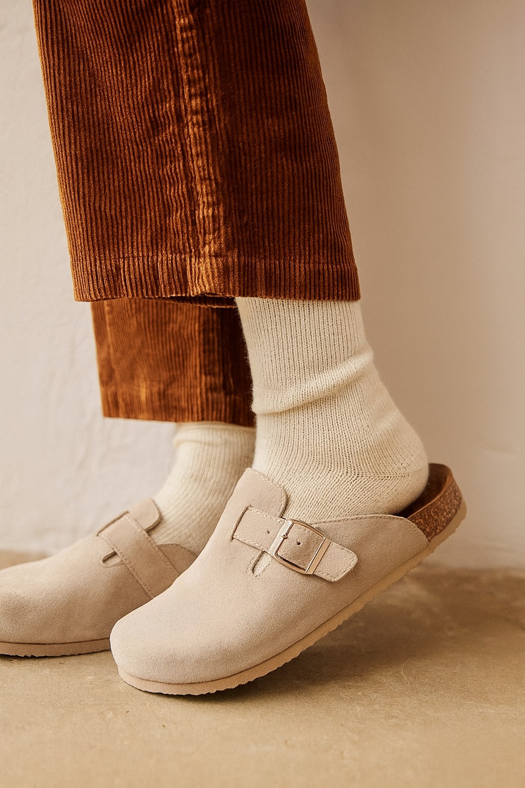 Sand suede buckle clog with cork footbed worn with cream socks